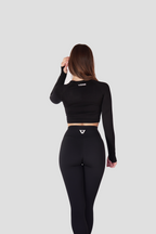 Conjunto VORE Essence negro en movimiento durante el entrenamiento